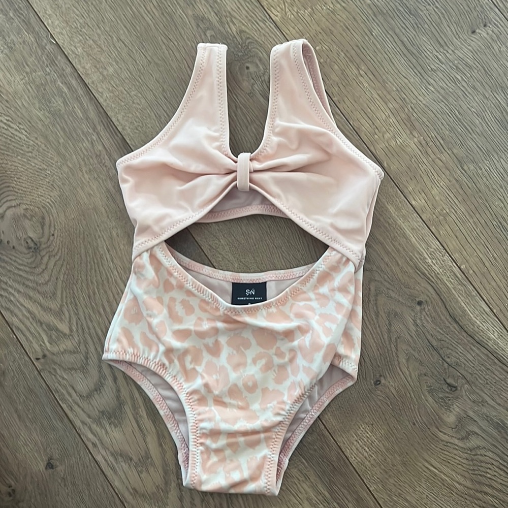 Something Navy baby swimsuit. Never worn. 9 months.
